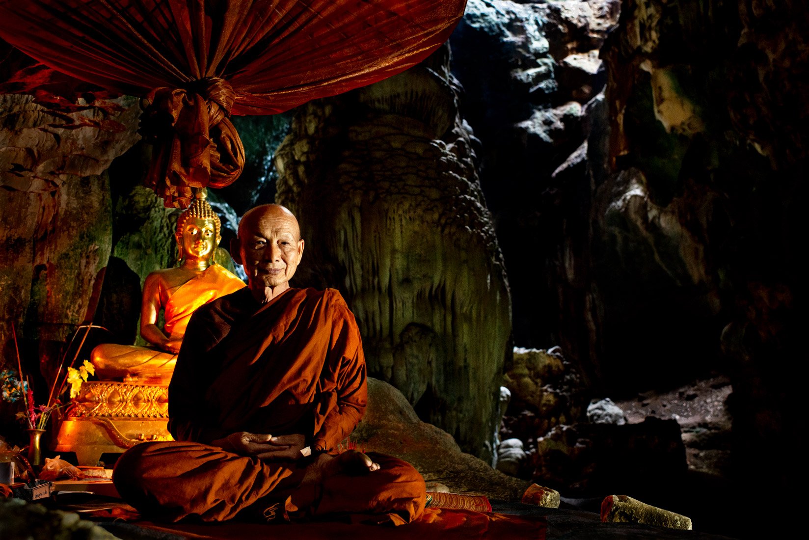 Buddhist monk in a cave on Doi Inthanon, Thailand