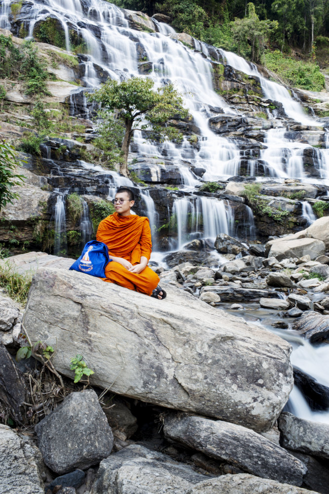 Monk at the waterfall during a Doi Inthanon Day tour